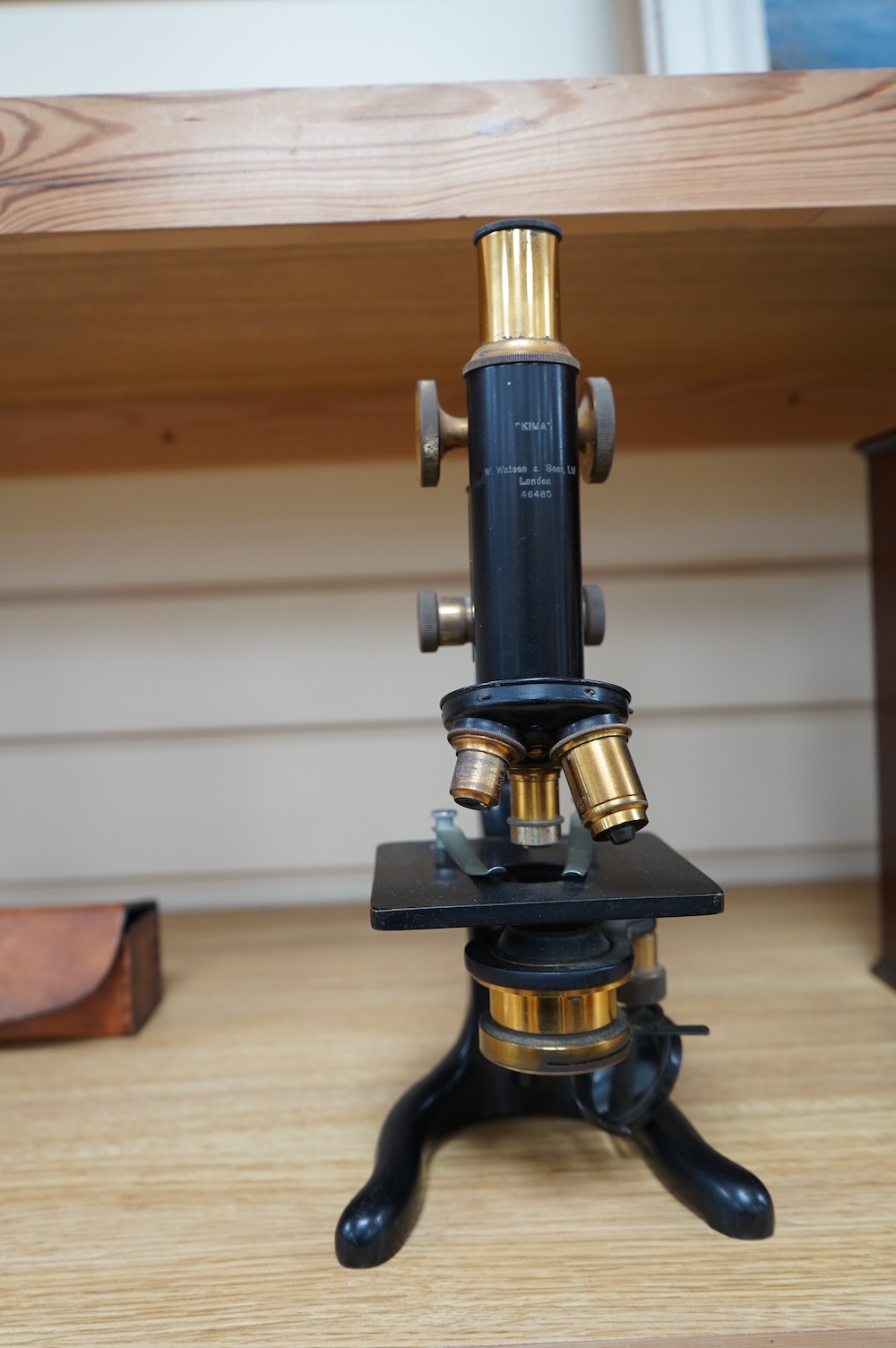 An early 20th century monocular brass microscope by W. Watson & Sons, 31cm high. Condition - fair to good.